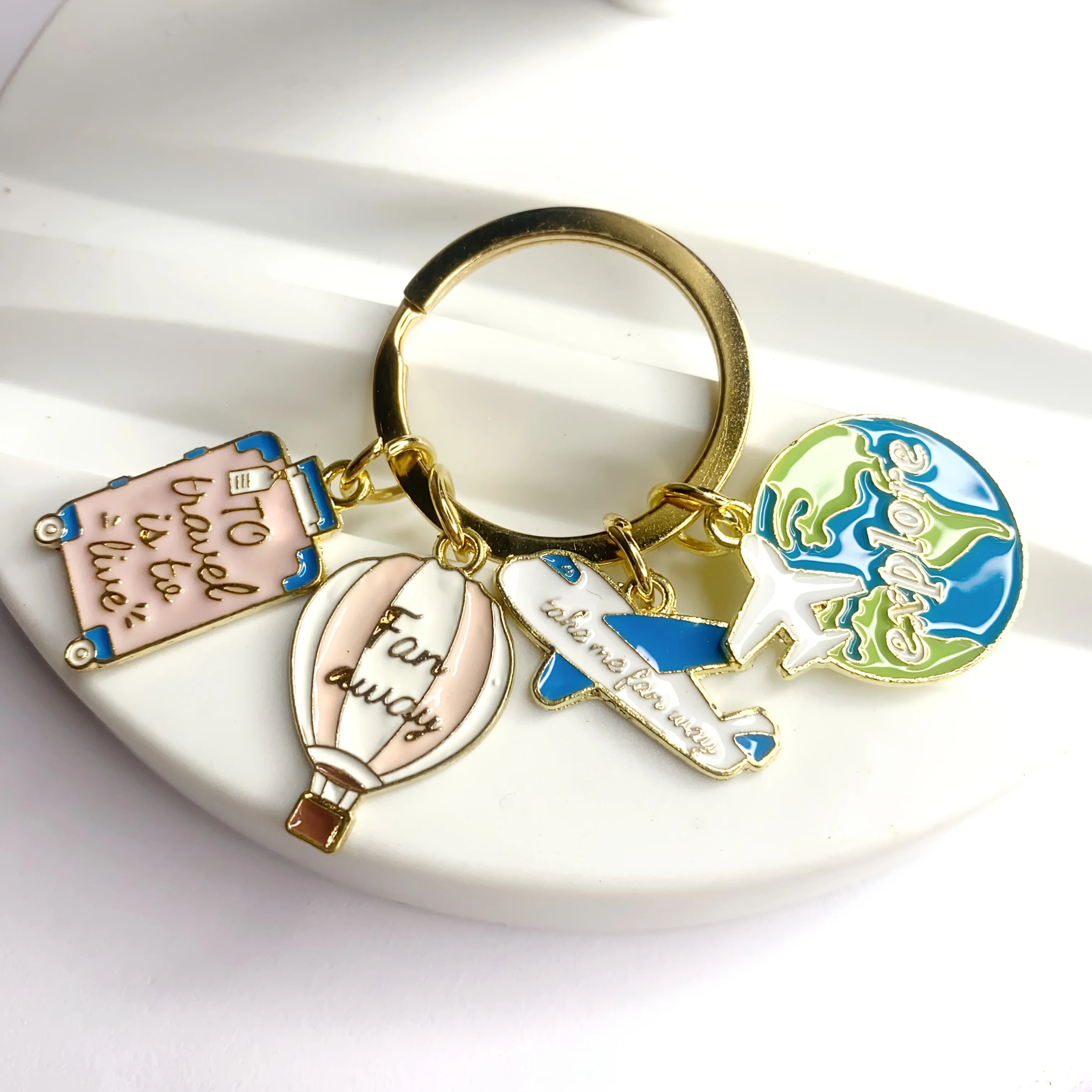 Travel Accessories As Gifts - A Stylish Travel-Themed Keychain Design with